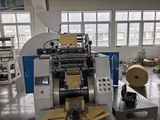 Máquina de vedação e corte de sacos Máquina de fabricação de sacos de papel Kraft com largura de saco de 420 a 600 mm e rolo de impressão cerâmica de 400 malhas